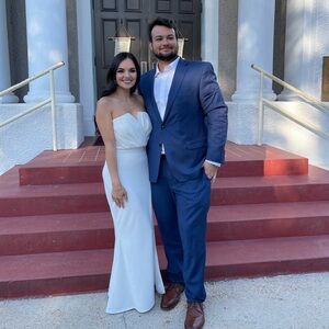 Long white dress, size medium. From Windsor wore once. Has a slit!